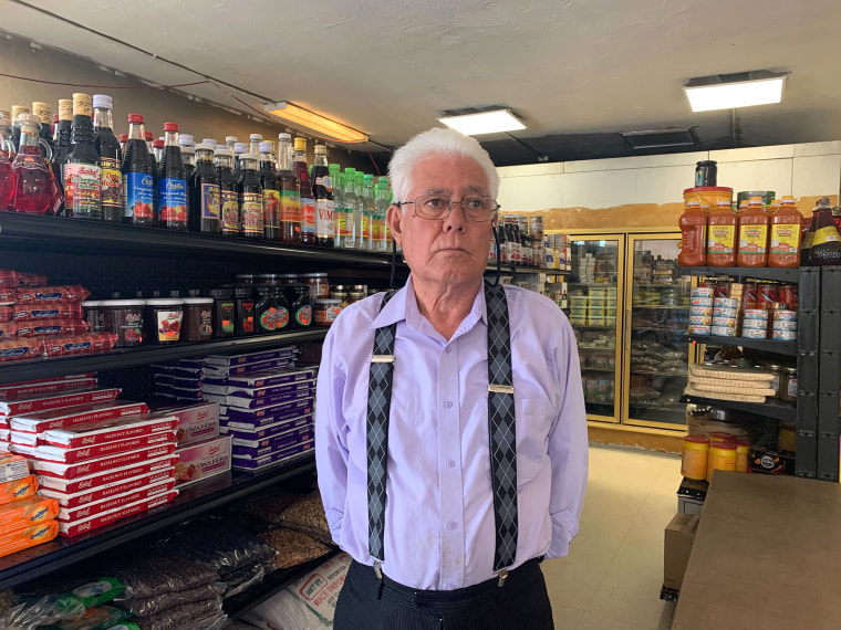 Sharief Hadi inside Ariana Halal Market & Caffe.  Hadi is the brother of shooting victim Mohammad Zaher Ahmadi.