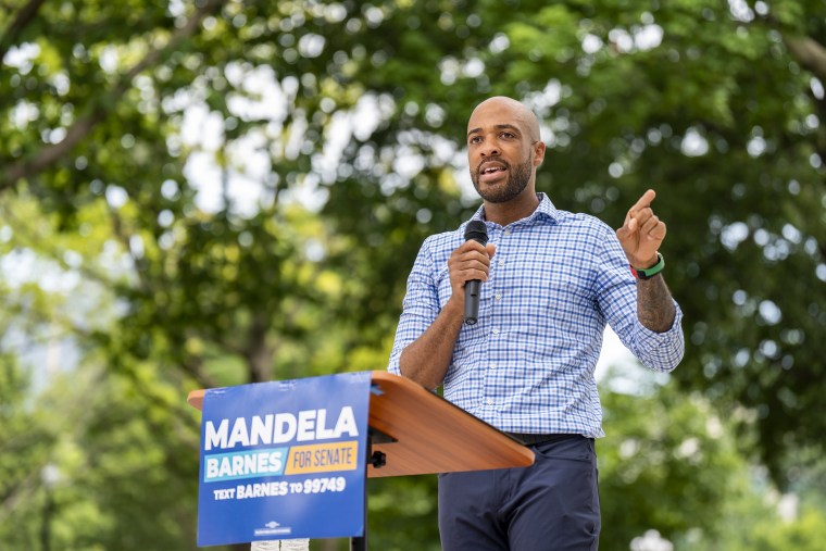 Image: Lt. Gov. of Wisconsin and democratic candidate for U.S. senate, Mandela Barnes, speaks to supporters at a rally outside of the Wisconsin State Capital building on July 23, 2022.