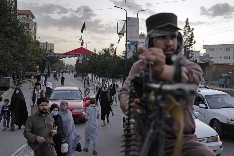 Taliban fighters stand guard in Kabul, Afghanistan, on Sunday.