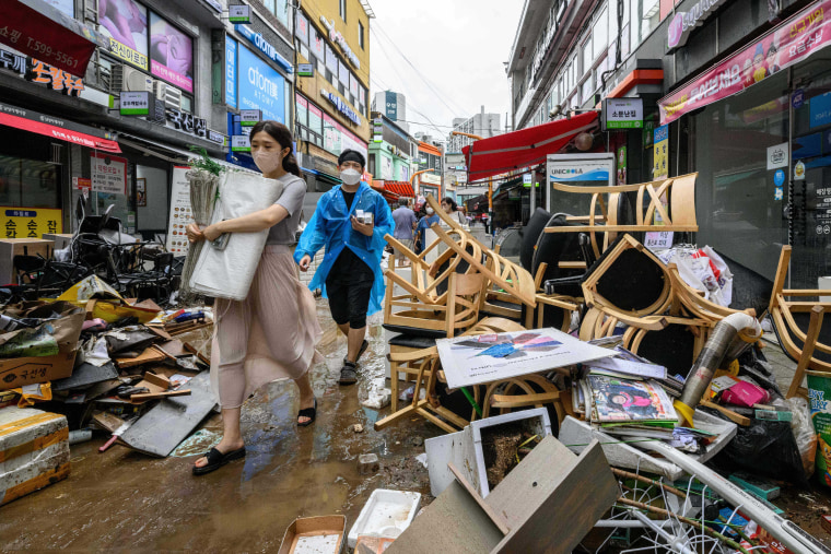 Image: TOPSHOT-SKOREA-WEATHER-FLOOD