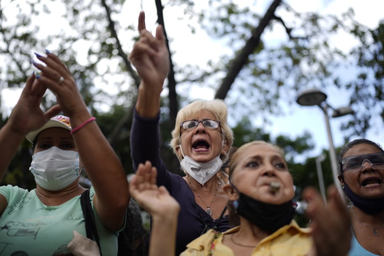 Image: Active and retired public workers, including teachers, protest for better salaries and the rest of their vacation bonus which they say was paid partially, as they march to the Labor Ministry in Caracas, Venezuela, on Aug 2, 2022.