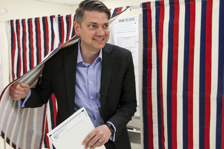 Nick Begich, a Republican candidate for both the special election and the regular primary for Alaska's open U.S. House seat, emerges from a booth after voting on Aug. 10, 2022, in Anchorage.