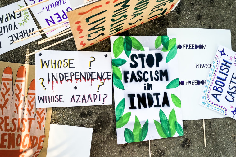 igns brought by protestors at the Indian Independence Day parade in Anaheim, Cali on Sunday.