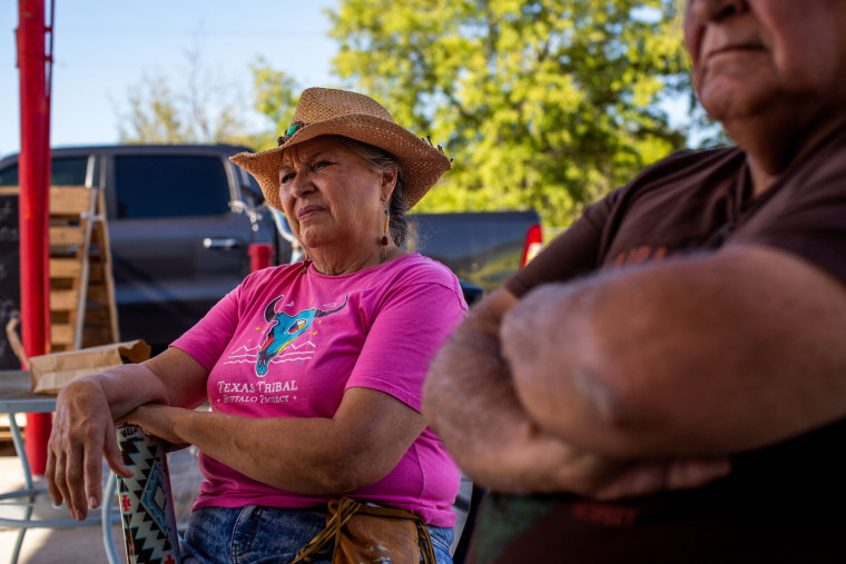 Anita Anaya listens during breakfast at Darla’s Kitchen in Brackettville, Texas, on Aug. 10, 2022.