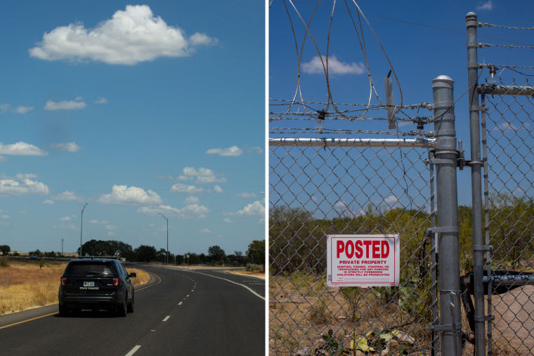 A Texas Department of Public Safety State Trooper drives down Highway 90 towards Brackettville; part of Texas Gov. Greg Abbott’s Operation Lone Star chain-link fence topped with razor wire separates a residential neighborhood bordering the Rio Grande River from the interior of the state in Del Rio, Texas.