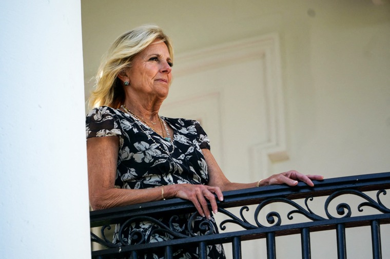 First lady Jill Biden watches as Marine One, carrying President Joe Biden, lands on the South Lawn of the White House on June 30, 2022.