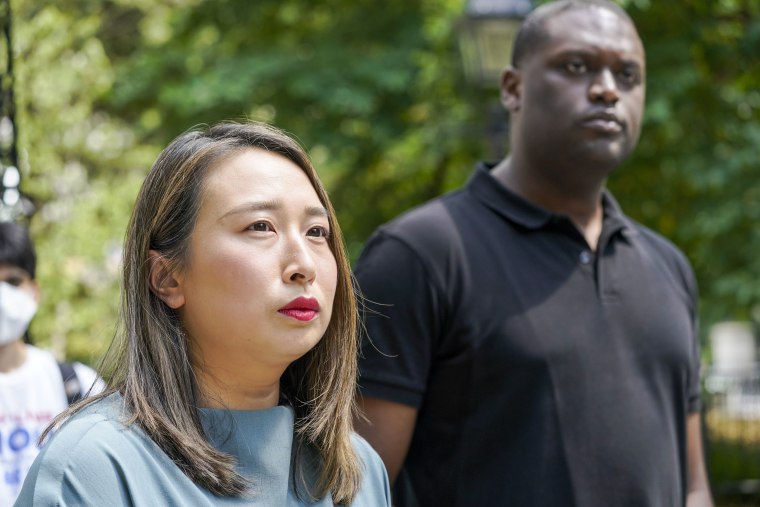 Assemblywoman Yuh-Line Niou, left, and Rep. Mondaire Jones stand together during a news conference to speak out against Dan Goldman's candidacy on Aug. 15, 2022, in New York.