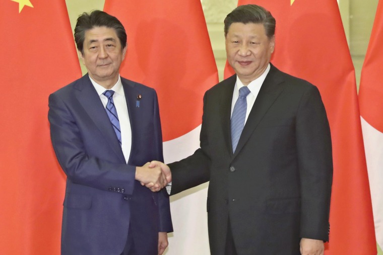 Japan’s late Prime Minister Shinzo Abe with Chinese President Xi Jinping in Beijing in 2019.