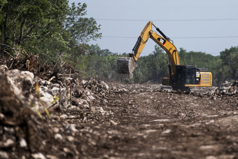 A bulldozer works to make way for the Maya Train in Puerto Morelos, Quintana Roo state, Mexico on Aug. 2, 2022.