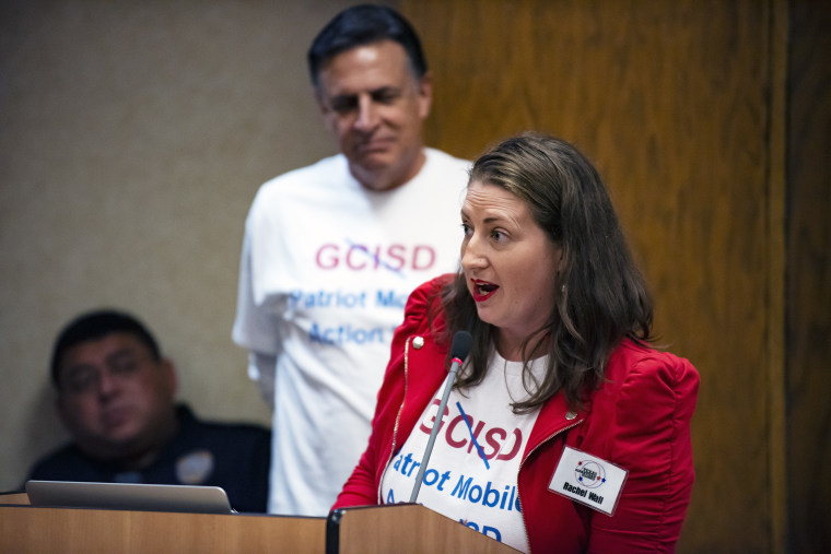 Image: Rachel Wall during the “Public Comment” portion of  a Grapevine-Colleyville Independent School District school board meeting in Grapevine, Texas on  Aug. 22, 2022.