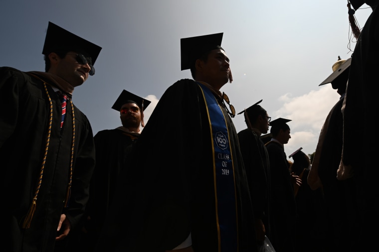 Students attend their graduation ceremony at UCLA