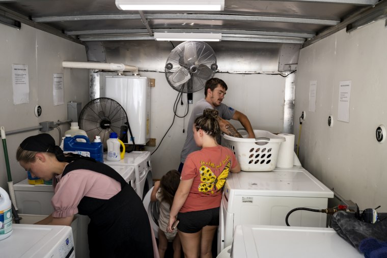 Image: Inside the laundry truck in downtown Buckhorn, Ky., on Aug. 19, 2022.