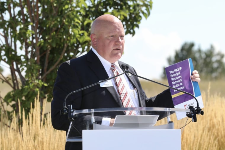 Kip Motta, NASSP President and principal of Rich Middle School in Utah, speaks at the Columbine Memorial on Aug. 22, 2022.