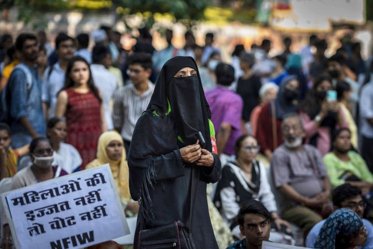A Muslim woman participates in a  demonstration in New Delhi