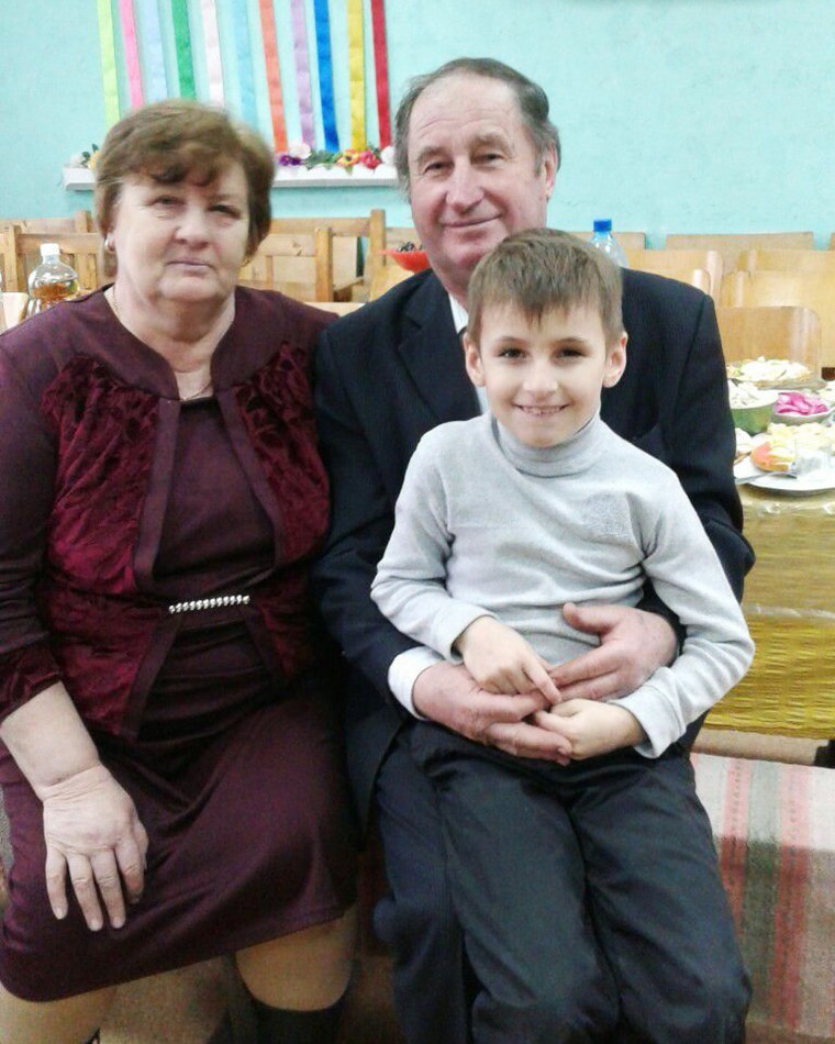 Andriy Bliznyuk with his grandparents Katerina and Oleksandr Chernoval.