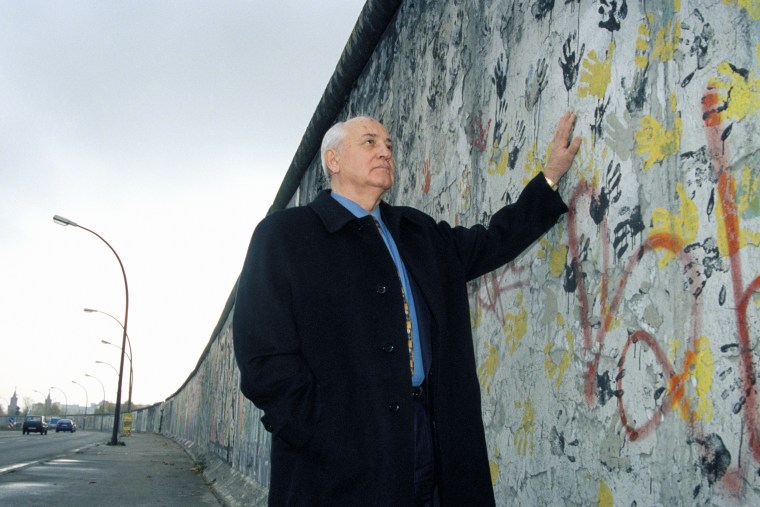 Mikhail Gorbachev, former Soviet leader and Nobel Peace Prize laureate, at the Berlin Wall in May 1998.