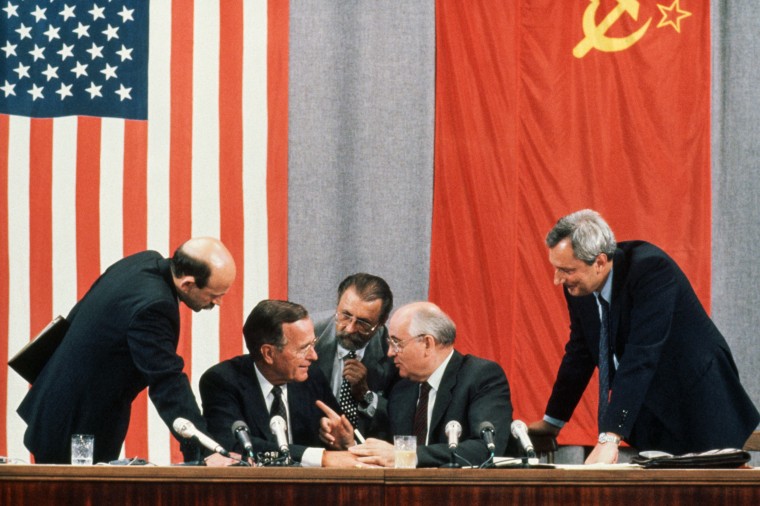 U.S. President George Bush and Soviet leader Mikhail Gorbachev laugh together during the 1991 Moscow Summit.