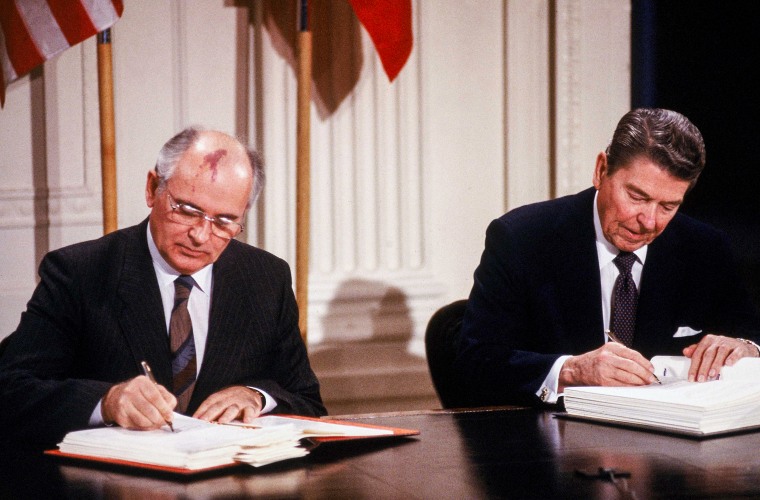 Soviet Union President Mikhail Gorbachev and U.S. President Ronald Reagan sign the Intermediate-range Nuclear Forces agreement in the East Room of the White House on Dec. 8, 1987.