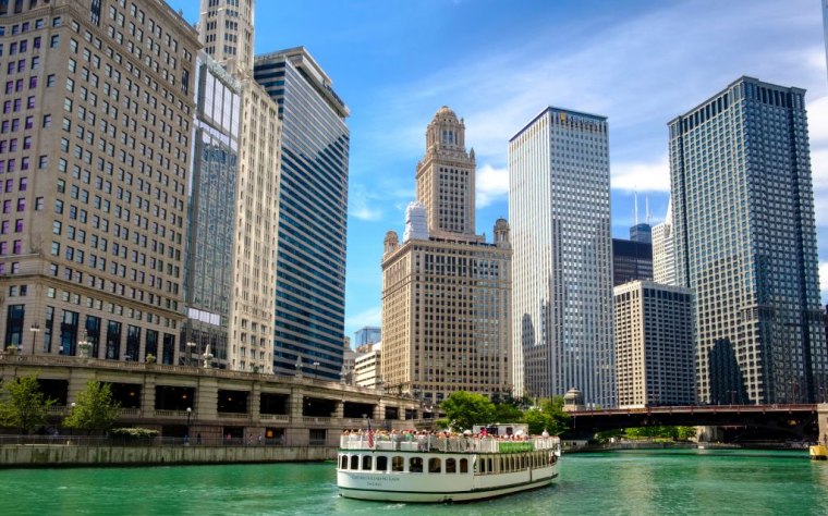 Chicago River and River Cruise with surrounding downtown architecture in summer, Chicago, Illinois