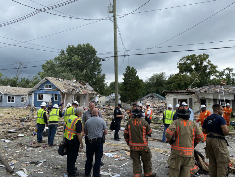 Rescue crews at the scene of the explosion.