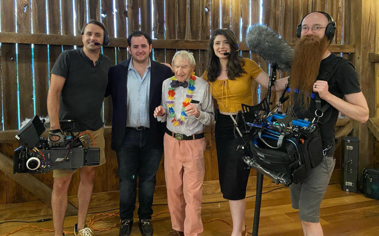 At his 100th birthday party in July, Tucker shared a happy moment with the film crew working on a documentary about his life.