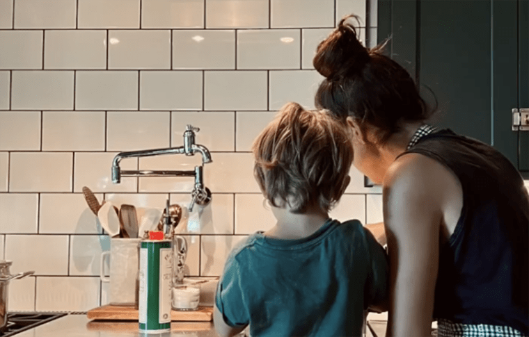 Joanna Gaines' youngest child, Crew, 4, helped his mom cook spaghetti sauce in the kitchen.
