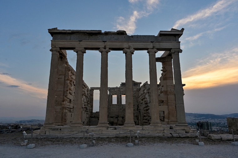 photo of ancient temple on Acropolis hill
