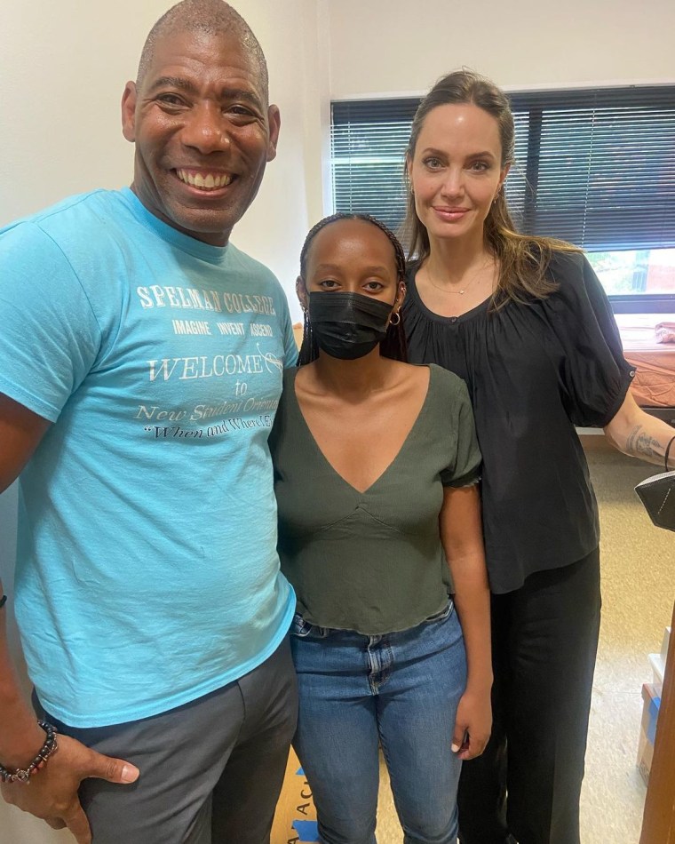 Dr. Daryl Holloman, vice president for student affairs at Spelman College, posed with Angelina Jolie and Zahara Jolie-Pitt, who will graduate with the class of 2026. 