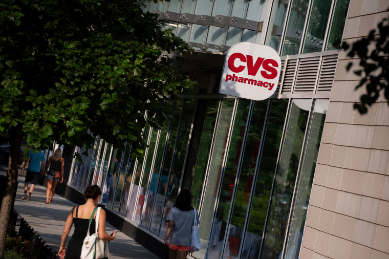 A general view of a CVS Pharmacy logo on a store location in Washington, D.C., on Thursday, July 22, 2021, amid the coronavirus pandemic. As the Delta variant of COVID-19 spreads rapidly in the America and around the world, this week in Washington negotiations over infrastructure legislation have continued in Congress.