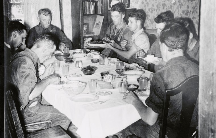 People Enjoying Their Dinner