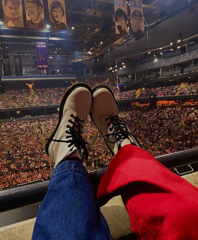 The pair wore matching white Doc Maartens for the concerts. Nari had to borrow his from his niece.