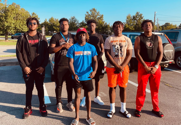 Georgia high school football players (L-R): Cesar Parker, Treyvon Adams, Antwion Carey, Messiah Daniels, Tyson Brown and Alto Moore helped save two women from a car crash. 