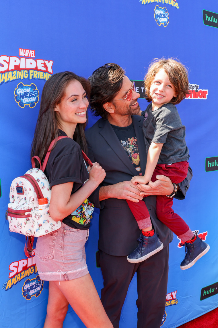 The family attend Disney Junior's "Marvel's Spidey and His Amazing Friends" VIP event at the Santa Monica Pier in California, on Aug. 27, 2022.