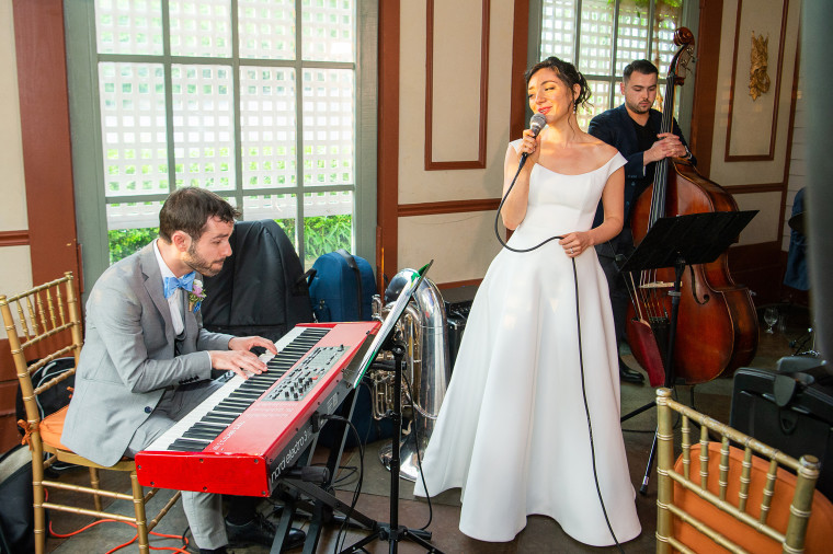 Julie Benko and Jason Yeager perform together at their wedding.