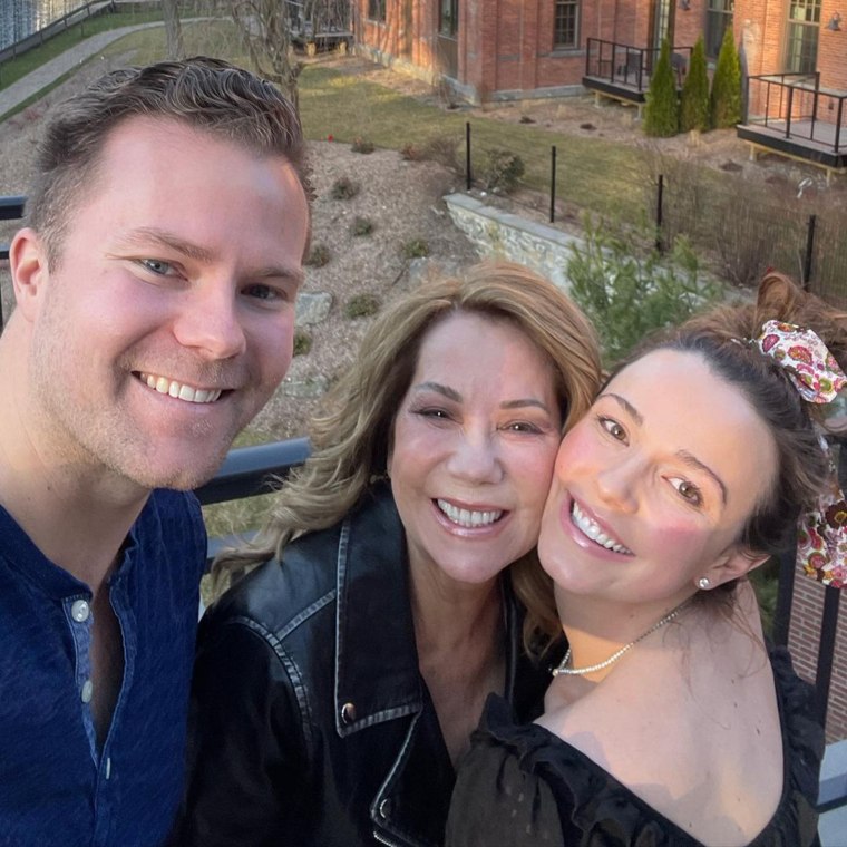 Cody Gifford poses with his mother, Kathie Lee and wife, Erika.