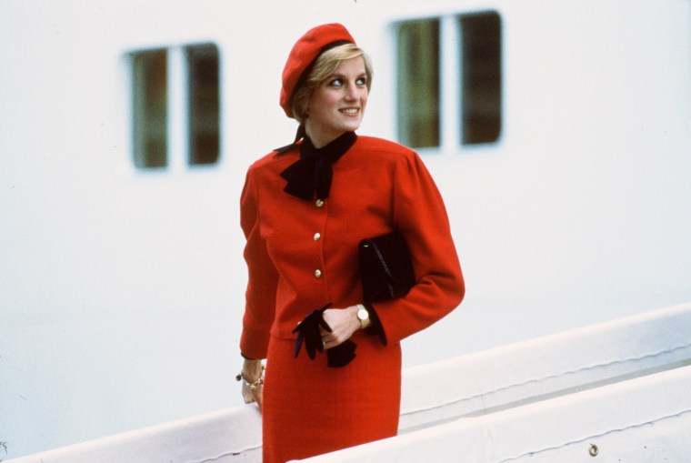 Diana, Princess of Wales wears a charm bracelet aboard the n