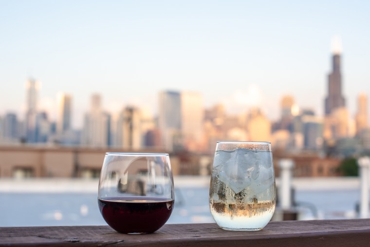 Wine glasses on a rooftop in the city