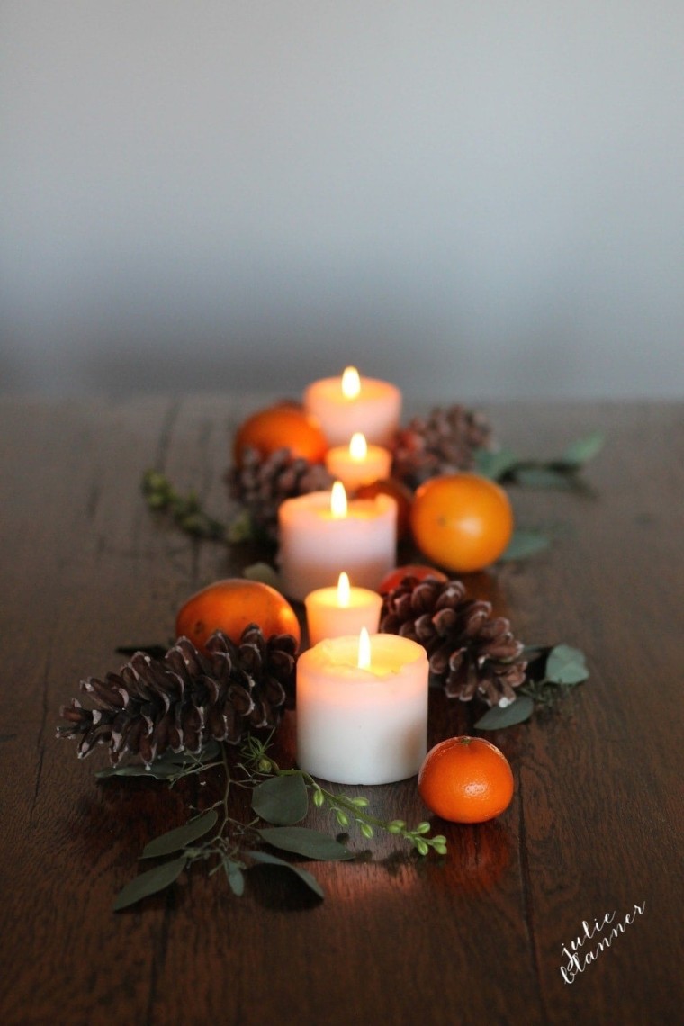 thanksgiving table decorations clementine and pinecone tablescape