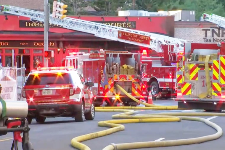 A vehicle crashed into a building in Arlington, Virginia, causing a structure fire and multiple injuries.