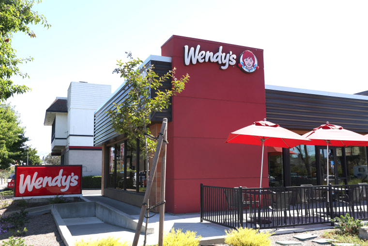 A sign is posted in front of a Wendy's restaurant on August 10, 2022 in Petaluma, California.