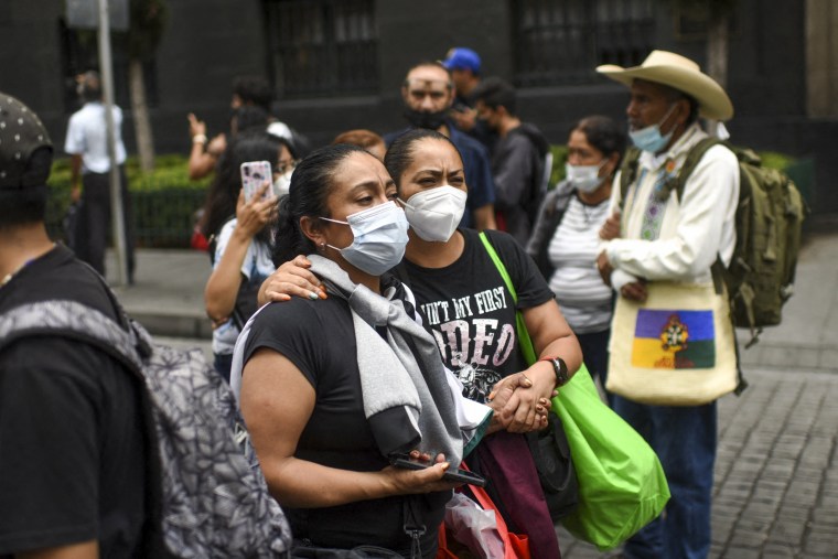 Image: People remain in the street after an earthquake in Mexico City on September 19, 2022.