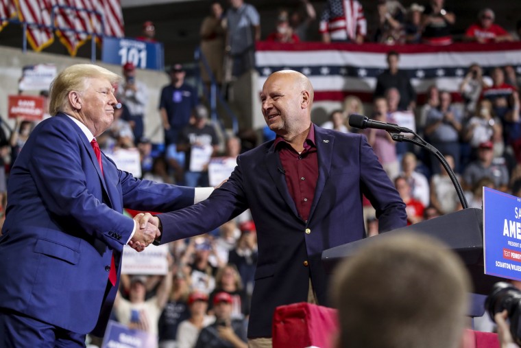 Image; Pennsylvania Republican gubernatorial candidate Doug Mastriano is greeted by former president Donald Trump at a rally on Sept. 3, 2022 in Wilkes-Barre, Pennsylvania.