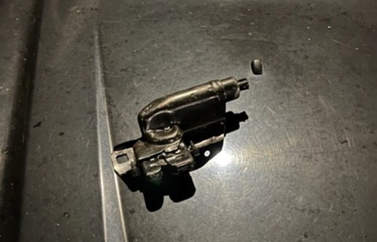 The black metal actuator held by Jermaine Petit at the time of the shooting.