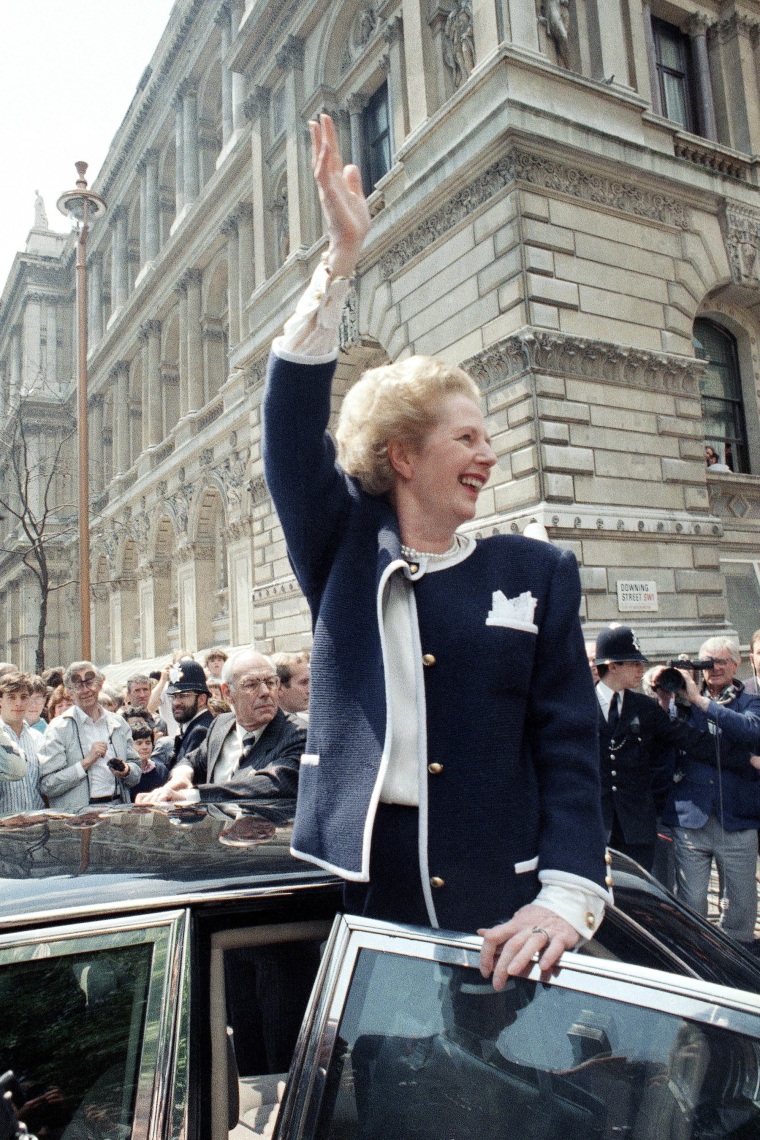 Prime Minister Margaret Thatcher waves to the crowd after being re-elected in June 1987. 