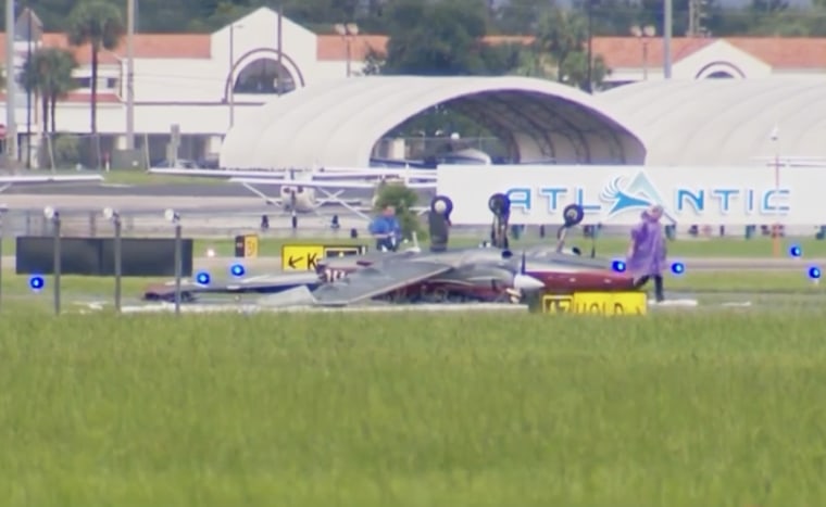 One person is dead and another injured after a twin-engine aircraft flipped over while taxiing for departure at the Orlando Executive Airport on Thursday, officials said.