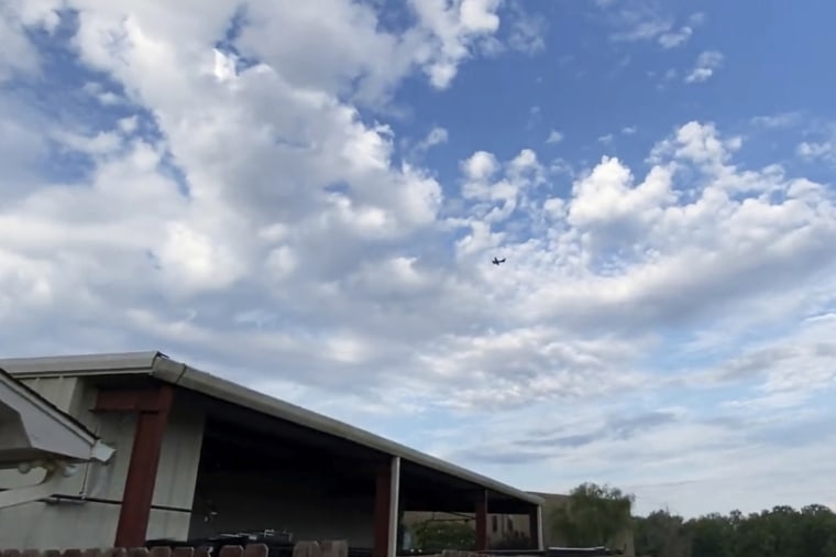A small airplane circles over Tupelo