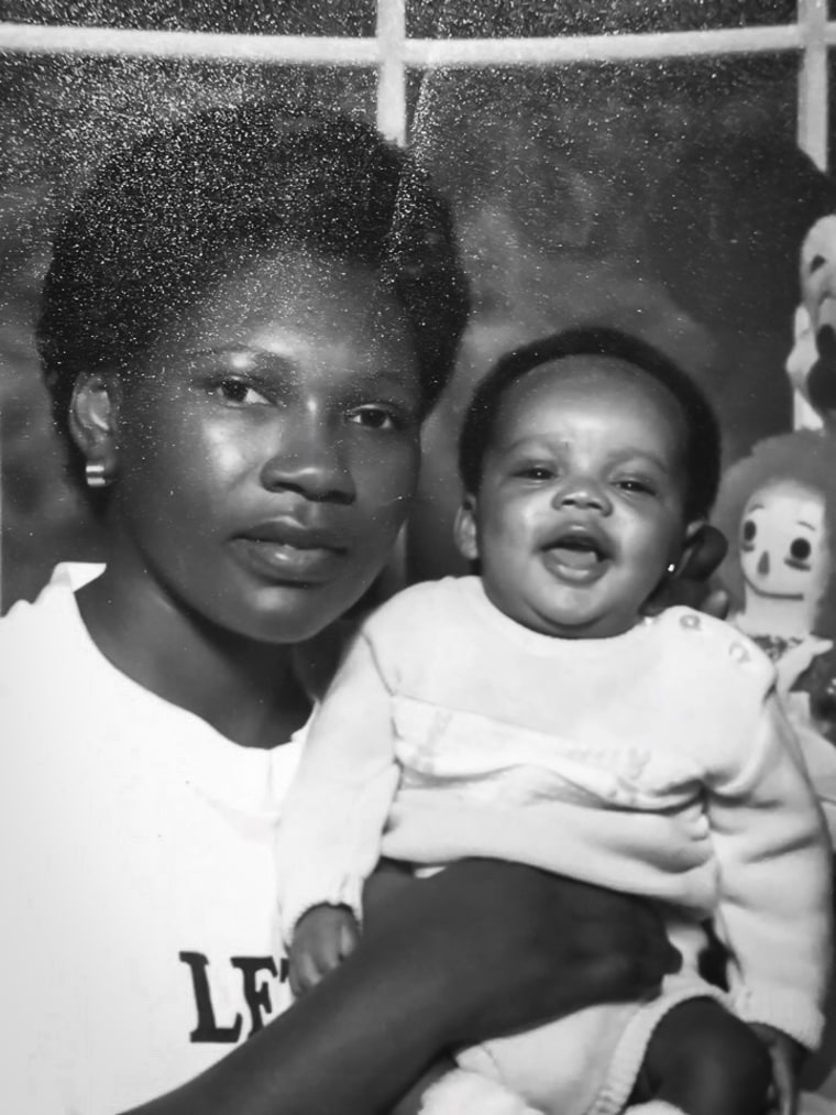 Myrtle Brown holds one of her sons.