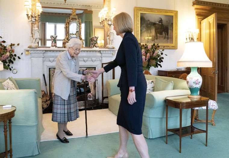 Queen Elizabeth II welcomes Liz Truss at an audience at Balmoral, Scotland, where she invited the Conservative Party leader to form a new British government.