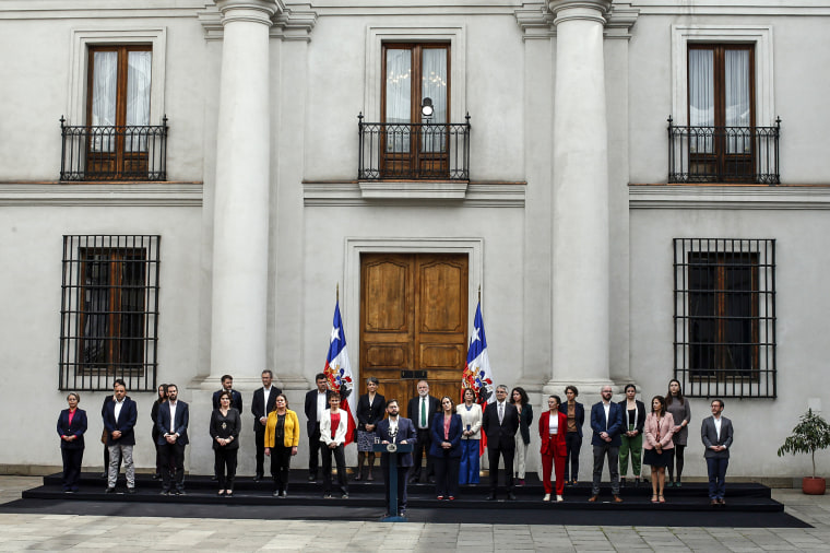 Image: Chile's President Gabriel Boric, center, speaks during a ceremony introducing new cabinet members, at La Moneda presidential palace in Santiago, Chile, on Sept. 6, 2022.