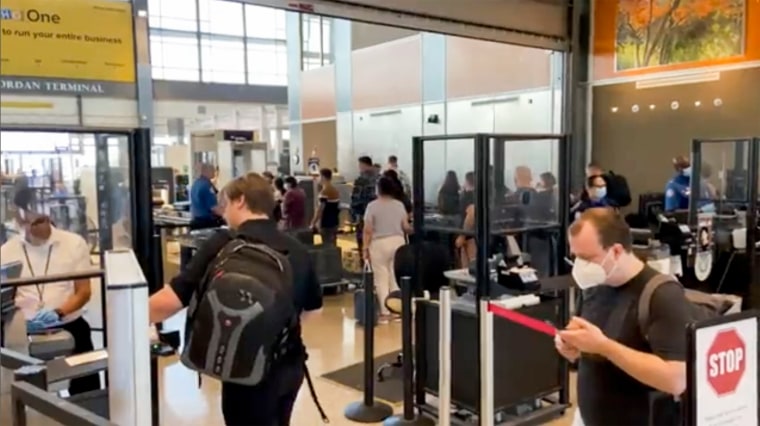 Travelers line up at a TSA screening area at Austin-Bergstrom International Airport in Austin, Texas, on Sept. 7, 2022.